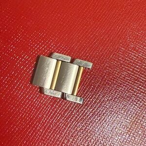 Silver and Gold Watch Link